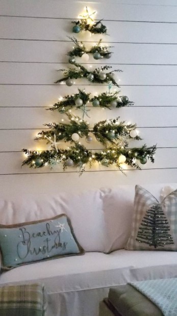 κλαδιά δέντρου τοίχος μικρό σπίτι Χριστούγεννα