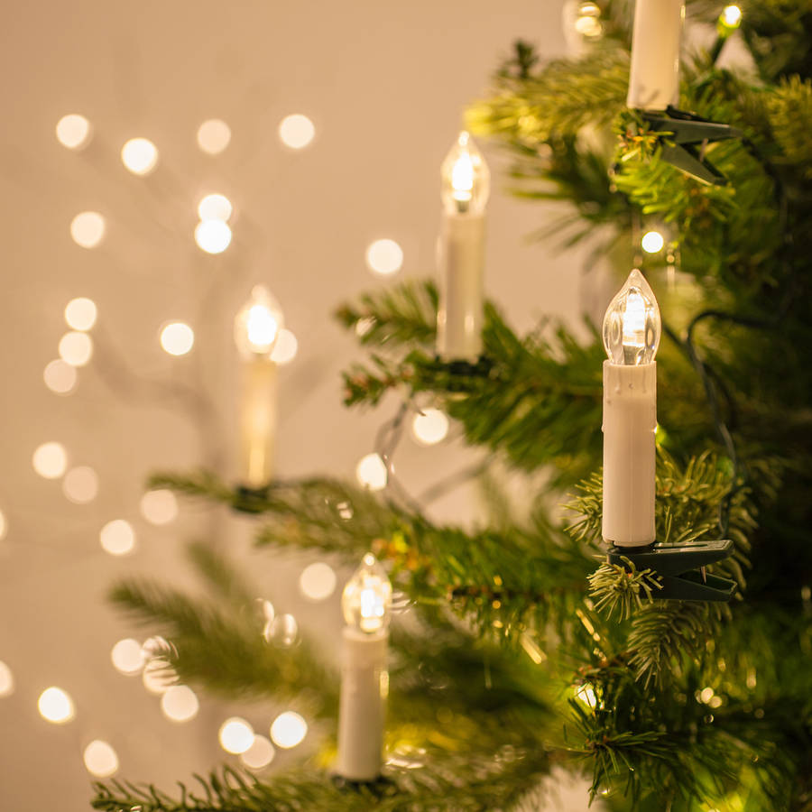 χριστουγεννιάτικη διακόσμηση με φωτιζόμενα κεριά μπαταρίας