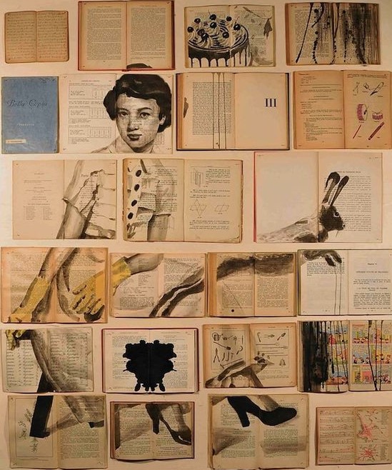 ιδιαίτερη διακόσμηση τοίχου με ανοιχτά βιβλία και ζωγραφισμένη κοπέλα